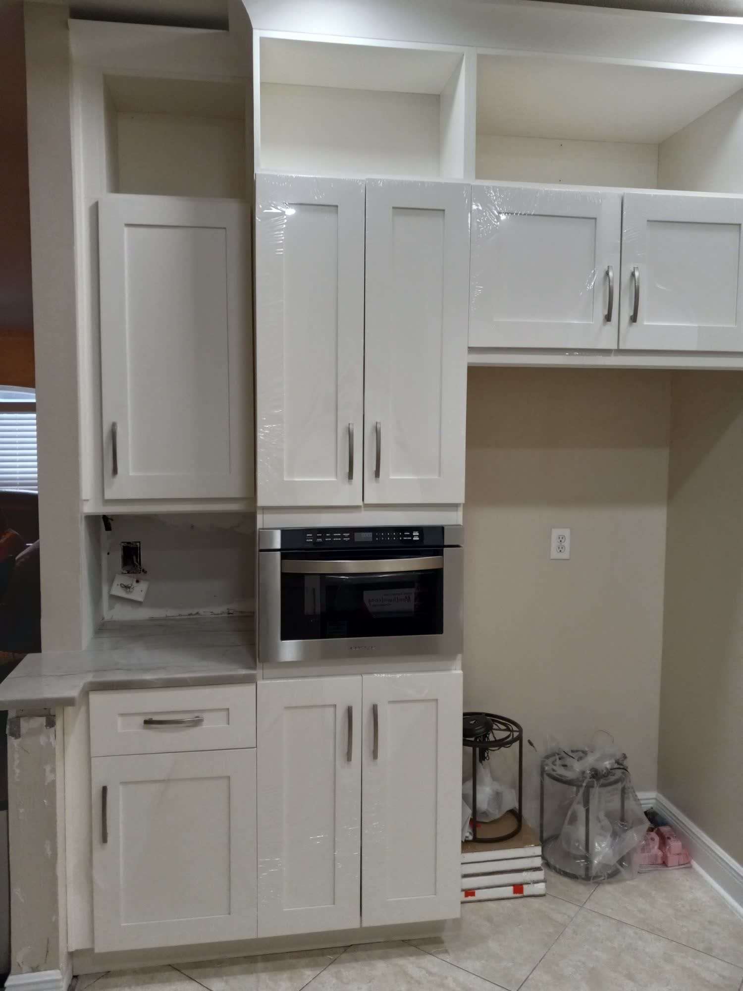 Kitchen cabinets and microwave tower in progress